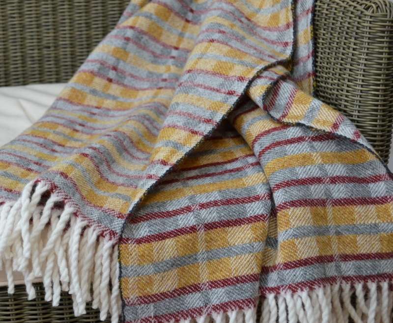 Handwoven 'Dukagang Stripe' throw in yellow ochre, mid grey and dark red
