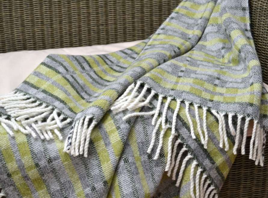 Handwoven 'Dukagang Stripe' lambswool throw in apple green, mid grey and dark green