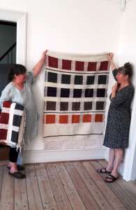 Setting up for the exhibition at The Festival of Weaving