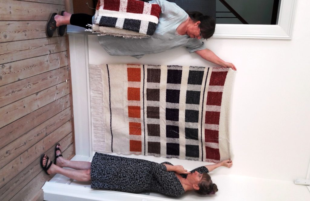 Setting up for the exhibition at The Festival of Weaving