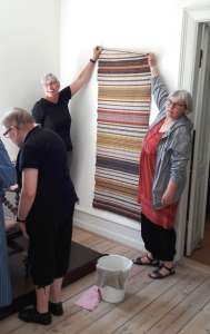 Setting up for the exhibition at The Festival of Weaving