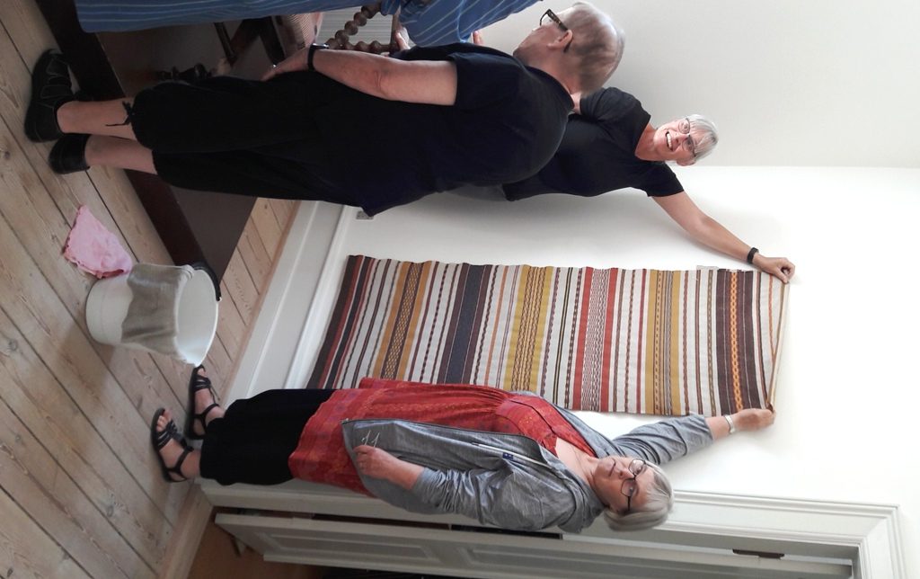 Setting up for the exhibition at The Festival of Weaving