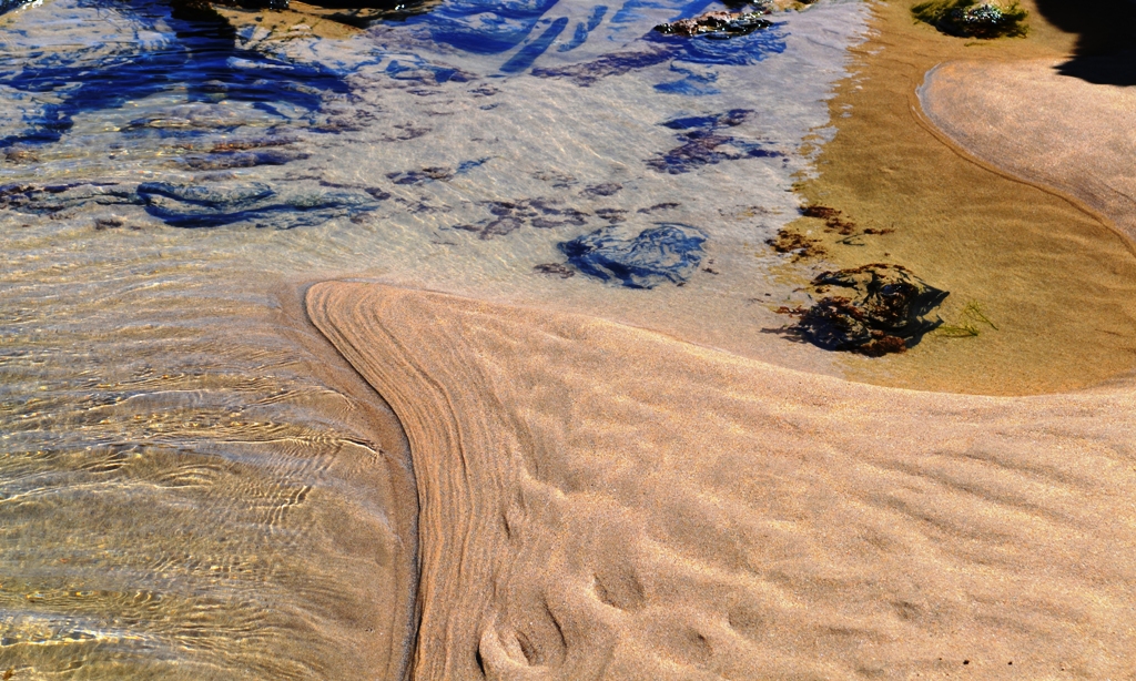 Low tide - ripples in the sand, ripples in the water