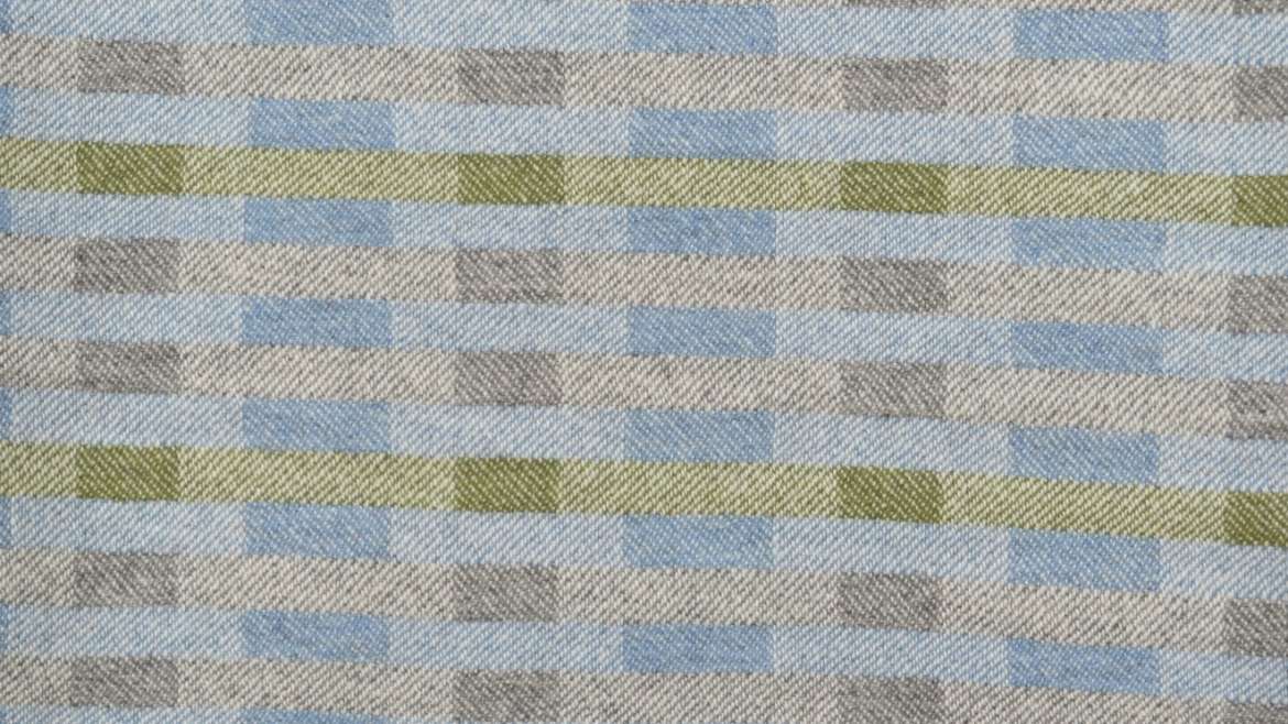 Lineal throw in blue, grey and green