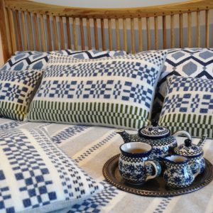 Handwoven lambswool Monksbelt throws and cushions