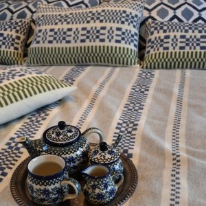 Handwoven monksbelt throw and cushions