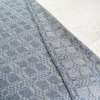 Coverlet throw in soft blue close up